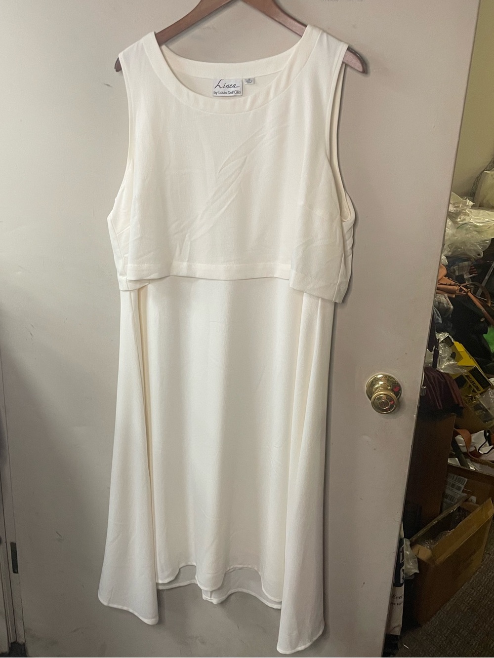 Linnea Sleeveless Layered cream dress size 1X with subtle side drop hem
